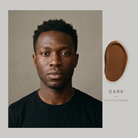 Model representing the Dark shade, with a Dark swatch of Stealth Blender